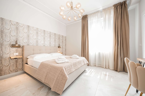 Frette Italian sheets, premium bedding, down comforters