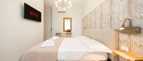 Frette Italian sheets, premium bedding, down comforters