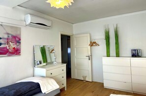 2 bedrooms, desk, iron/ironing board, travel cot