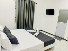 Family Triple Room, Balcony, City View | Iron/ironing board, free WiFi