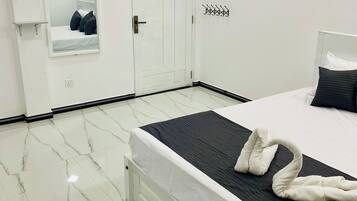 Family Triple Room, Balcony, City View | Iron/ironing board, free WiFi
