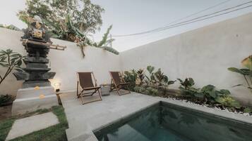 Outdoor pool, pool umbrellas, pool loungers
