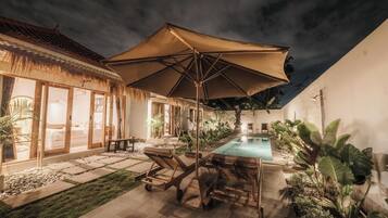 Outdoor pool, pool umbrellas, pool loungers