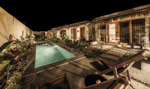 Outdoor pool, pool umbrellas, sun loungers