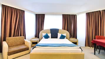 Premium bedding, down comforters, pillowtop beds, minibar