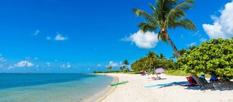 Sunset Harbor Waterfront Villa with Dock, Cabana Club
