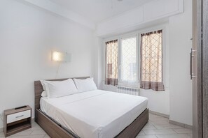 Apartment, 2 Schlafzimmer, Gartenblick | Bügeleisen/Bügelbrett, kostenloses WLAN, Bettwäsche
