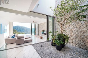 Exclusive Villa, 5 Bedrooms, Balcony, Sea View | Living area - Sea Theatre Kata by ROI (Karon)