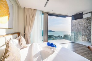 Vila executiva, 4 quartos, vista para o mar | Ferros/tábuas de passar roupa, Wi-Fi de cortesia, roupa de cama