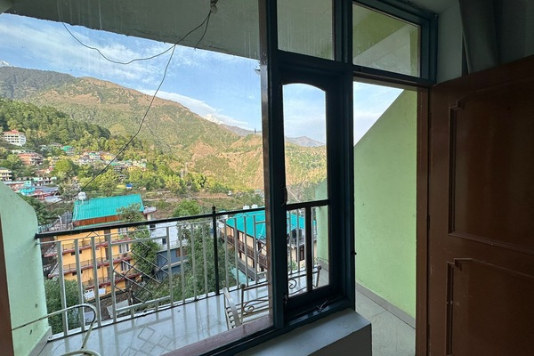 Quarto casal superior, vista para a montanha | Fachada