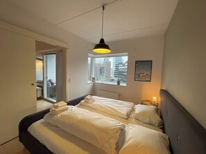 1 bedroom, desk, iron/ironing board, travel cot