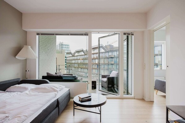 1 bedroom, desk, iron/ironing board, travel crib