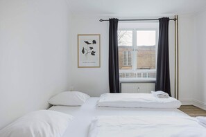 2 habitaciones, tabla de planchar con plancha, wifi y ropa de cama 