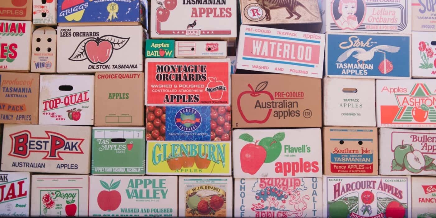 A collection of vintage apple brand packaging.