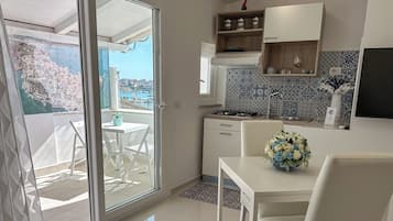 Apartemen, pemandangan marina | Dapur pribadi