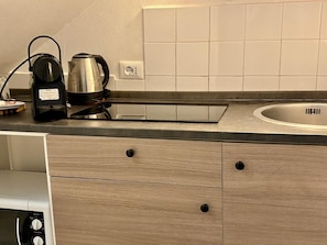 Fridge, microwave, dishwasher, coffee/tea maker
