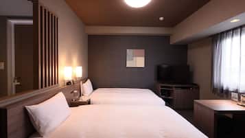 Twin kamer, niet-roken | Een bureau, een laptopwerkplek, een strijkplank/strijkijzer, gratis wifi