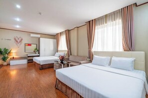 Family Suite, City View | Soundproofing, iron/ironing board, free WiFi