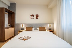 Estudio tradicional | Tabla de planchar con plancha, wifi gratis y ropa de cama