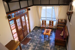 Deluxe Double or Twin Room, Balcony, Mountain View | Living area | 32-inch flat-screen TV with digital channels, fireplace