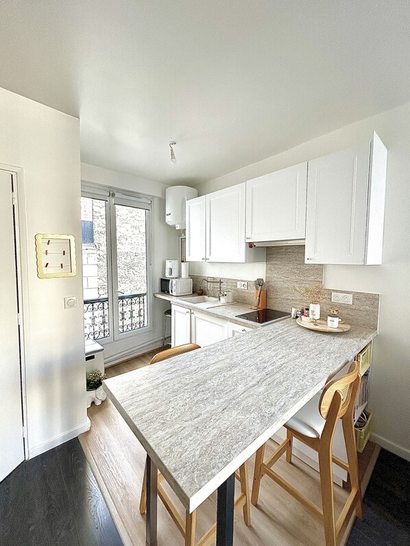 Fridge, microwave, cookware/dishes/utensils