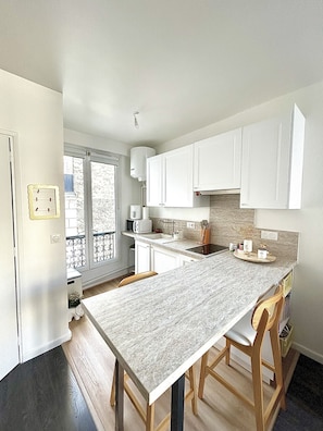 Fridge, microwave, cookware/dishes/utensils