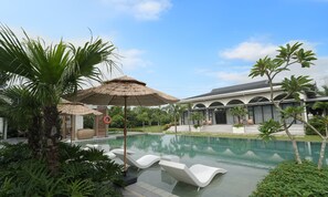 Outdoor pool, open 9:00 AM to 9:00 PM, sun loungers