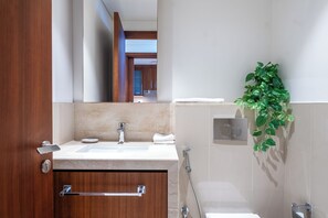Hair dryer, towels, soap, toilet paper