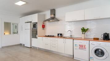 Fridge, microwave, oven, cookware/dishes/utensils