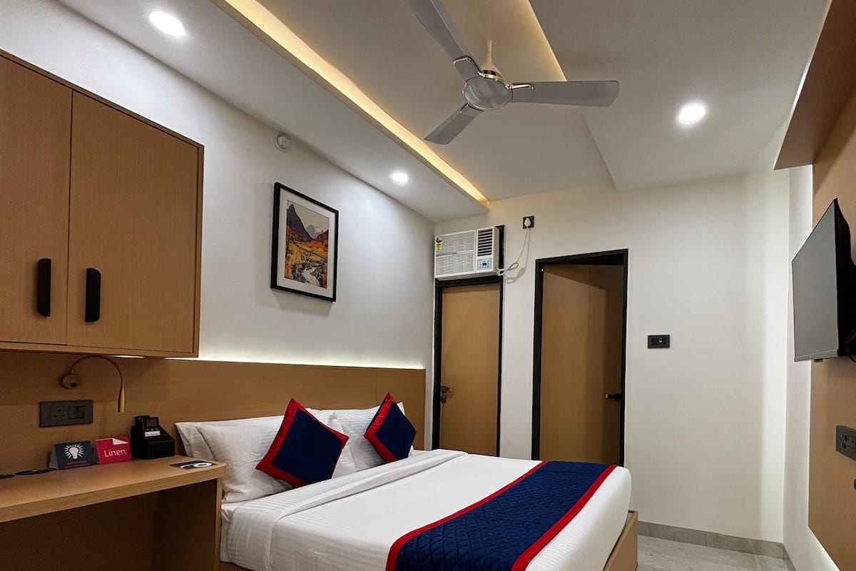 Habitación superior | Ropa de cama de alta calidad y caja de seguridad en la habitación