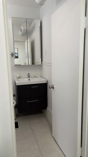 Hair dryer, towels, soap, toilet paper