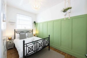 2 habitaciones, tabla de planchar con plancha, wifi y ropa de cama 