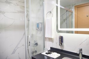 Shower, free toiletries, hair dryer, slippers