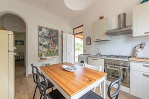 Apartment, 2 Bedrooms, Terrace | Private kitchen | Fridge, oven, stovetop, electric kettle - Isola delle Femmine Apartments by Wonderful Italy (Isola delle Femmine)