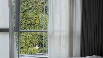 Habitación doble Deluxe | Minibar, escritorio, cortinas blackout y insonorización