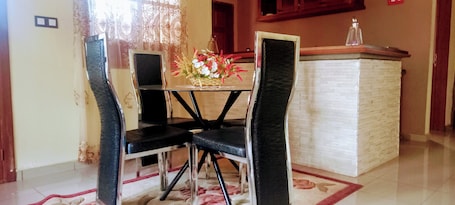 Dining. Furnished 2 bedroom apartment Barrière, parking downtown ebolowa.