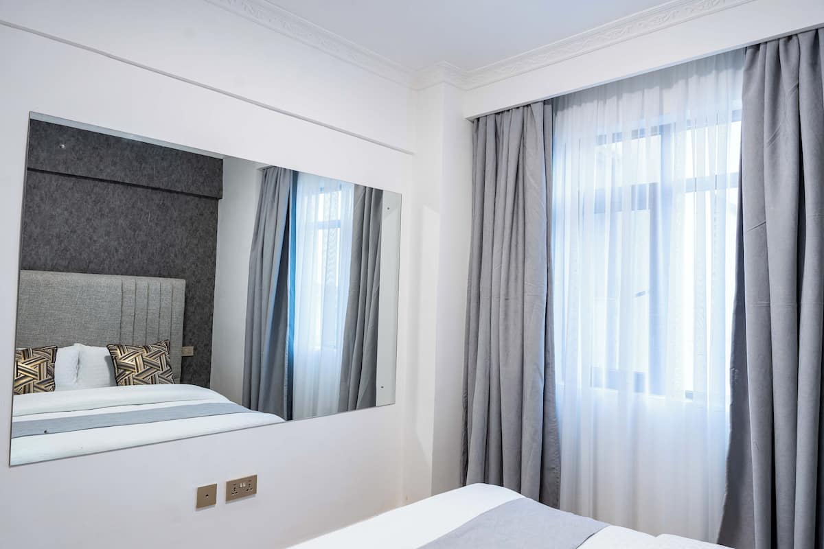 Superior Apartment, 2 Bedrooms, Balcony, City View | In-room safe, desk, laptop workspace, blackout drapes
