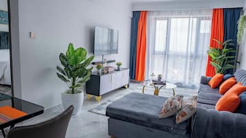 Superior Apartment, 1 Bedroom, Balcony, City View | Living area