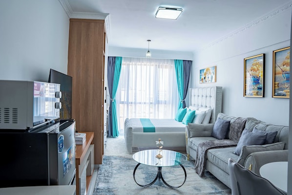 Superior Studio, 1 King Bed, Private Bathroom, City View | In-room safe, desk, laptop workspace, blackout drapes