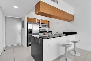 Fridge, microwave, oven, stovetop - Edgewater High-Rise | Stunning Bay Views + Gym (Miami)