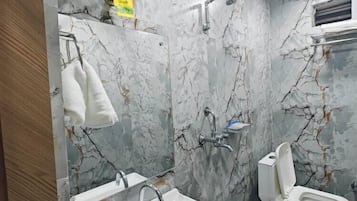 Shower, free toiletries, towels, soap