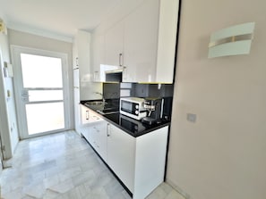 Fridge, microwave, coffee/tea maker, electric kettle