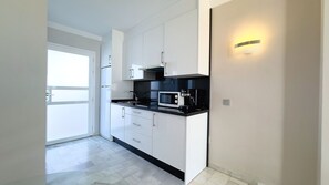 Fridge, microwave, coffee/tea maker, electric kettle