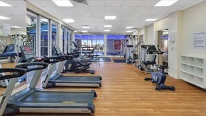 A gym with treadmills, elliptical machines, and weight equipment. - Chevron With 3beds and own Carpark Within Tower3 (Gold Coast)