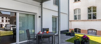 Appartement 'Punkt15' avec terrasse privée, jardin privé et Wi-Fi