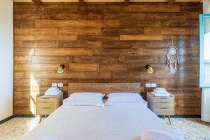 3 habitaciones, tabla de planchar con plancha, wifi y ropa de cama 