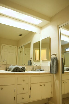 Hair dryer, towels, soap, toilet paper