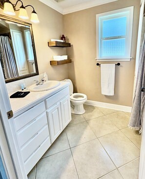 Hair dryer, towels, soap, toilet paper