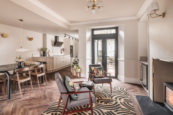 TV, fireplace, books