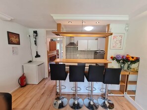 Fridge, microwave, oven, cookware/dishes/utensils